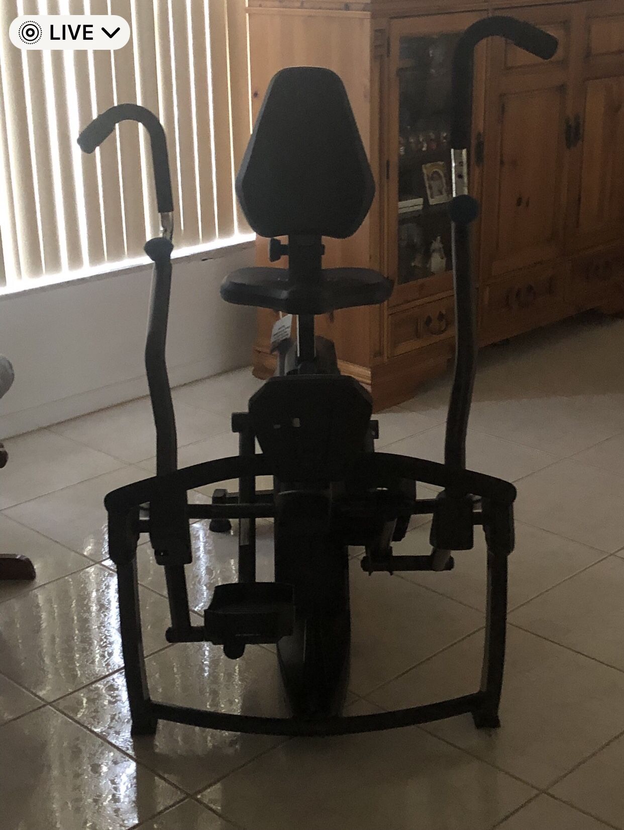 Exercise bike with foot petals and arms that move for the perfect workout