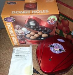 Nostalgia Electrics Red Donut Hole Maker/Bakery box and appliance set features a non-stick baking plate that makes seven hot donut holes, cake pops, o