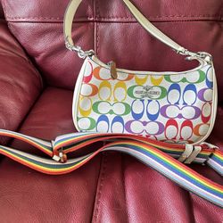 Various Michael Kors  And Coach Purses And Wallets. 