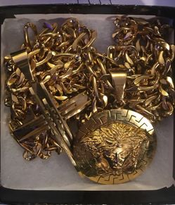One 18k gold dip Figueroa Link Chain with Versace Pendant and Cross Pendant