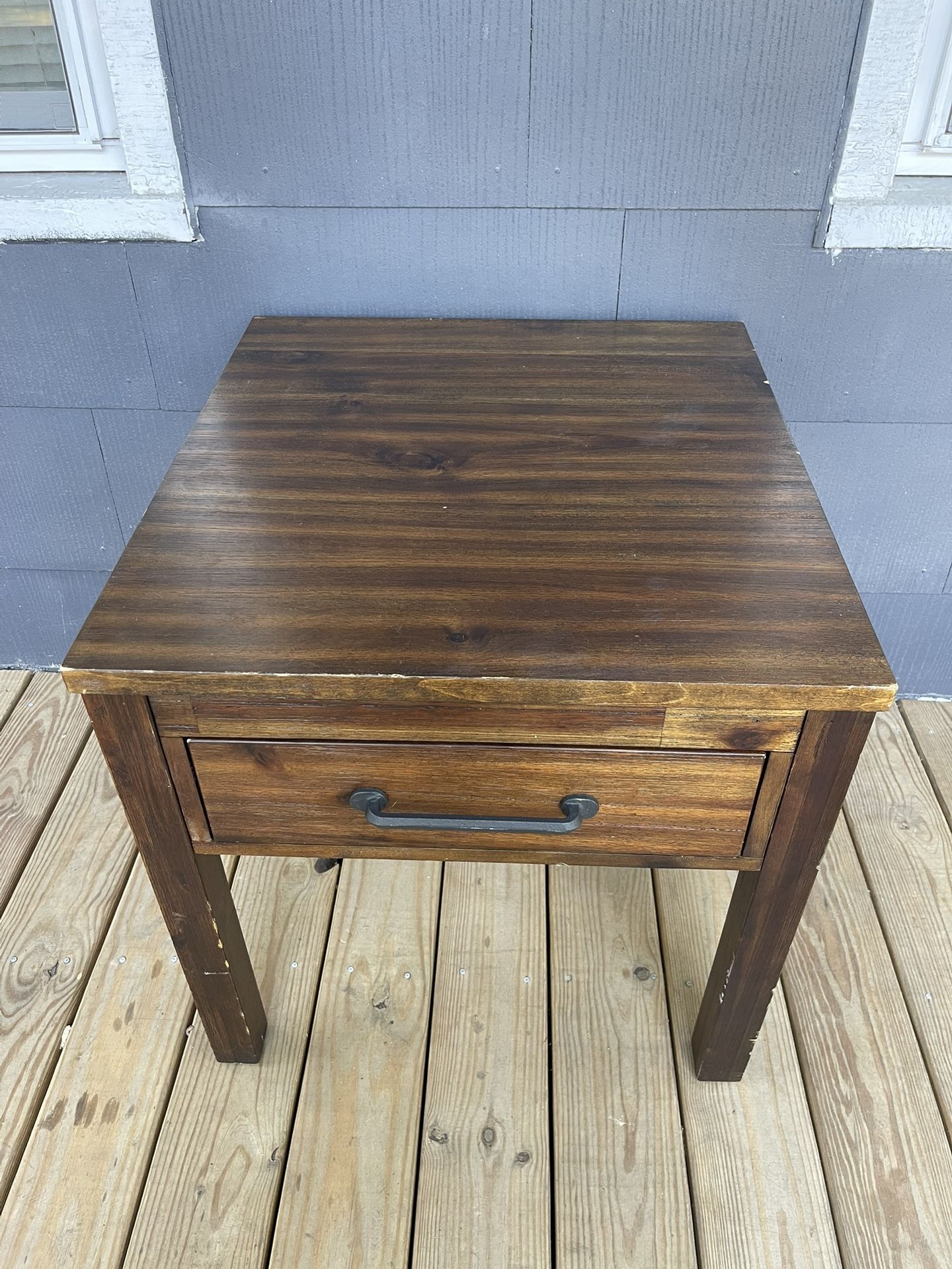 Dark wood medium size side table with drawer a little scratched