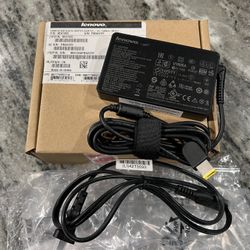 Lenovo 65W AC Adapter slim tip. P/N 0B47455. New. Sealed. Few available.
