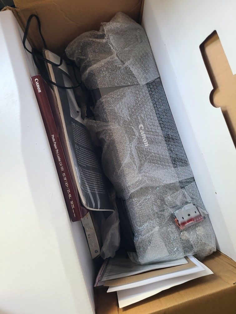Canon photo printer + paper + ink