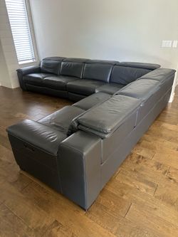 Grey leather sectional (with power recliners for foot and head rests)