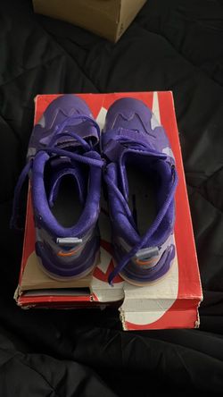 Nike Purple Sneakers with Orange Accent