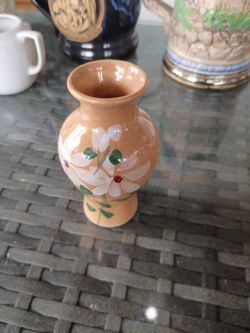 Right tan flower vase
