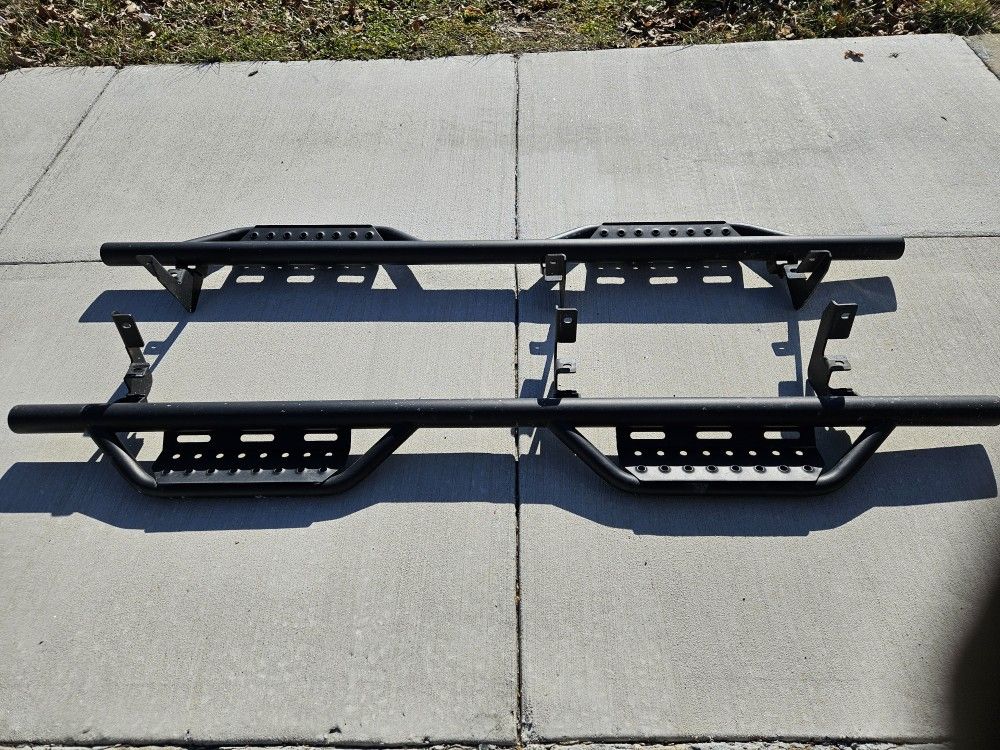 Nerf Running Boards/ Amp Research Side Steps.