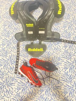Football Youth Shoulder Pads With Cleats Barely Used.