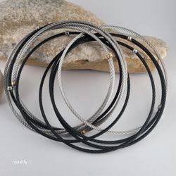 Charriol Genève Steel 10-Row Cable Bangle Bracelet with 18K Yellow Gold Accents – 6.75” Wrist/ Pulsera de Acero Diseño de Cable con Detalles de Oro! ?