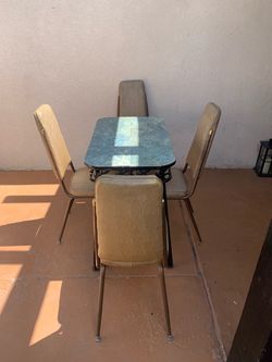 Vintage 6.5ft table with 4 chairs