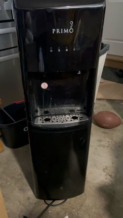 Used primo water dispenser with 5-5 gal including rack!