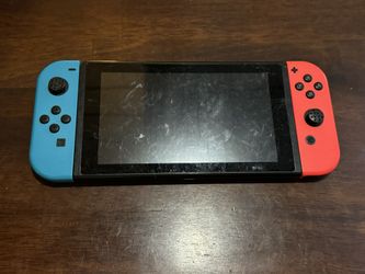 Nintendo Switch With Red And Blue Joycons Console