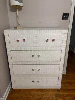 White Wicker 4-Drawer Dresser with Flower Knobs