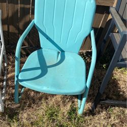 A Small Chair And A Matching Table 