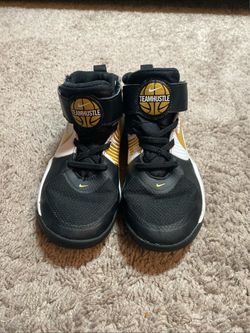 Nike Team Hustle mid top Basketball sneakers size 13C