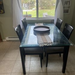 Beautiful glass dining table with 4 chairs and matching sofa table/entry table 