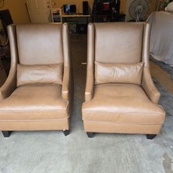 Classic traditional wingback style. High back for excellent support. Decorative exposed dark wood legs.