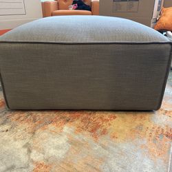 Ottoman. Owned 2 months . no stains pets etc 