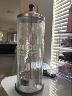 Barbicide container.