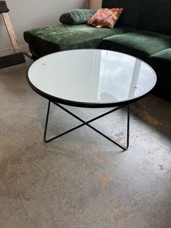 Round glass coffee table (in store)