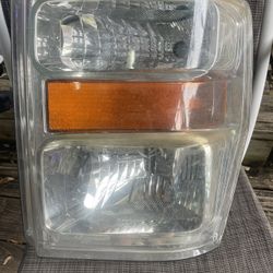 Ford F250-F350-F450-F550 Driver Side OEM Headlight 
