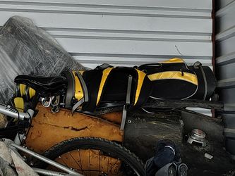 Black and Yellow golfs club.