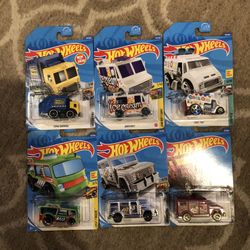 Six different hot wheel city trucks