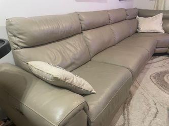 Beige leather sectional couch
