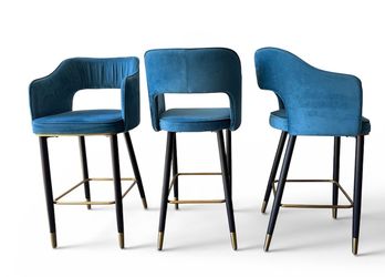 A set of 3 stylish counter-height bar stools.  Perfect for a kitchen island, home bar, or dining area