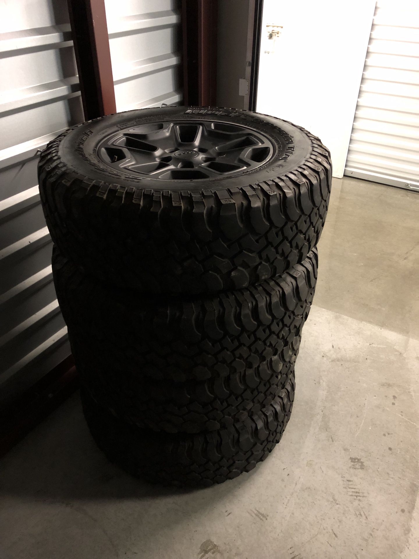 2018 matte black Jeep rubicon wheels rims are bfgoodrich mud terain tires