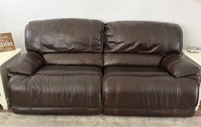 Dark brown electric reclining sofa