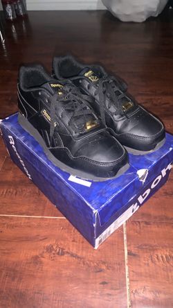Reeboks Size 9.5 Black and gold