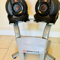 New Pair Of BowFlex SelectTech 552 Adjustable Dumbbells With Stand