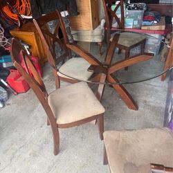 Glass table with chairs