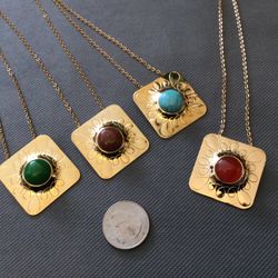 New 20” necklaces with gemstones. $18 each.  Stainless steel chain with gold plating.
