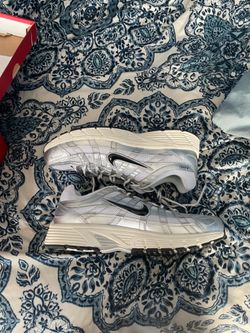 Nike p6000 metallic silver