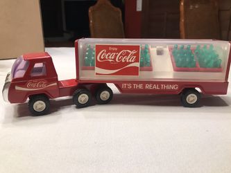 Antique Coco Cola truck with bottles