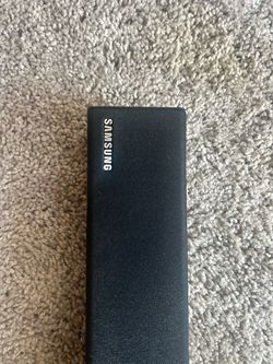 black Samsung soundbar features a mesh grille design