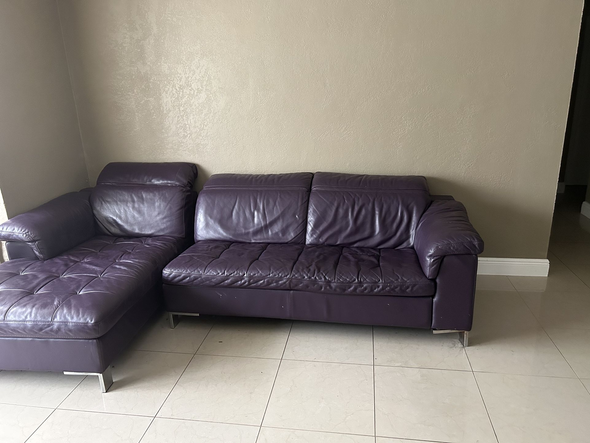 Purple Leather Sofa $100