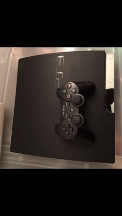 PS3 console with controller