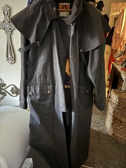 Vintage Kakadu Traders Australia women's black oilskin waxed cotton duster, often called a "drovers coat." Large size in great condition.