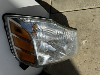 Genuine Nissan Titan Armada Right Side Headlight Assembly, 2004-15