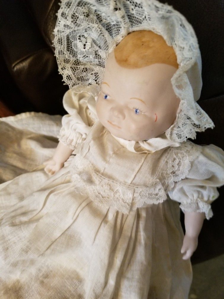 Antique Porcelain Doll In Original Clothes