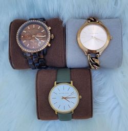 RELOJ  MK Originales $110, por los tres.