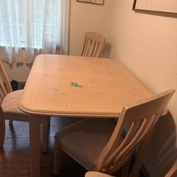 Table and four chairs