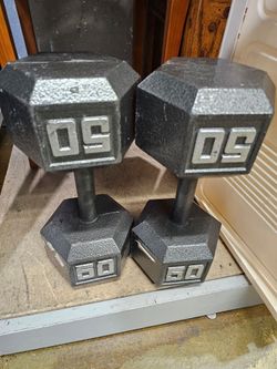 2 <<50Lb cast hex dumbbell/ pesa de 50lb