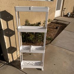 Plastic narrow 4 tier shelf with wheels