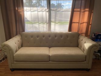 Beige linen tufted sofa