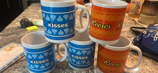 5 Hershey mugs.