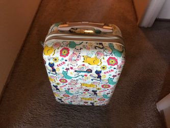 Carry-on Luggage by Lily Bloom Cat Design Pattern..hard case with spinning wheels and measures 23” tall X 13” wide X 9” wide